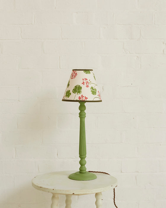 Geraniums, paper lampshade, empire