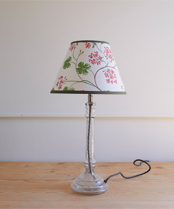 Geraniums, paper lampshade, empire