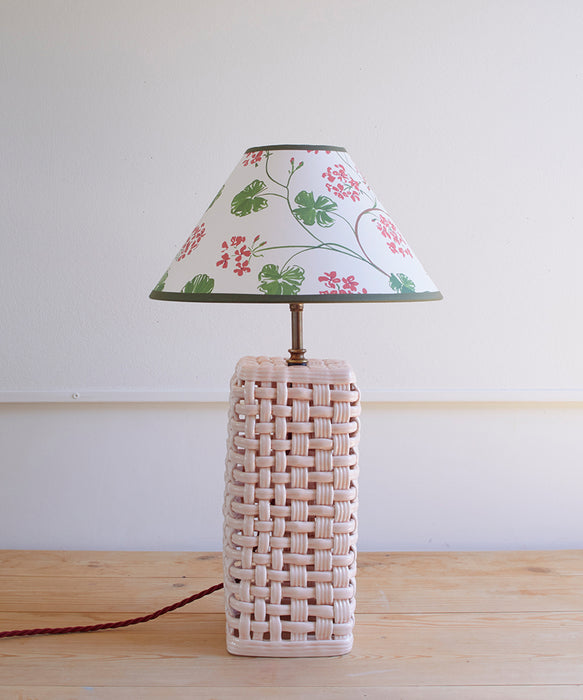 Geraniums, paper lampshade, conical