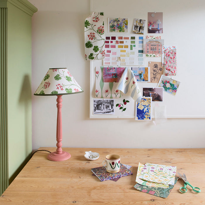 Geraniums, paper lampshade, conical