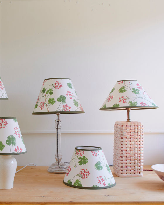 Geraniums, paper lampshade, empire